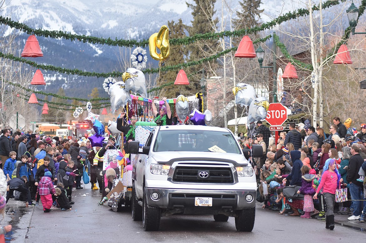 Floats make their way down Central Avenue Saturday during the Whitefish Winter Carnival Grand Parade. This year&#146;s theme for the 59th  annual Carnival was &#147;Fly Like an Eagle.&#148; (Heidi Desch/Whitefish Pilot)