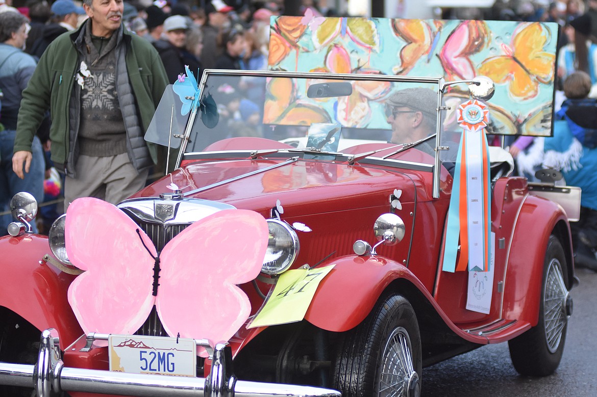 Floats make their way down Central Avenue Saturday during the Whitefish Winter Carnival Grand Parade. This year&#146;s theme for the 59th  annual Carnival was &#147;Fly Like an Eagle.&#148; (Heidi Desch/Whitefish Pilot)