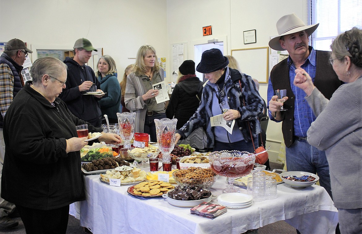 Several hors d&#146;oeurves were provided to pair with the different wines including chocolates, nuts, and a variety of cheeses during Saturday&#146;s library fundraiser held in the Alberton Community Center, which also houses the town library. (Kathleen Woodford/Mineral Independent)