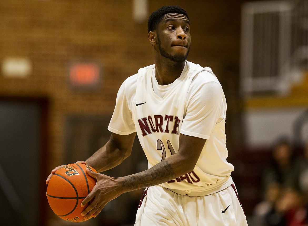 Charles Williams of North Idaho College looks to pass the ball to a teammate during last Wednesday&#146;s game at NIC.