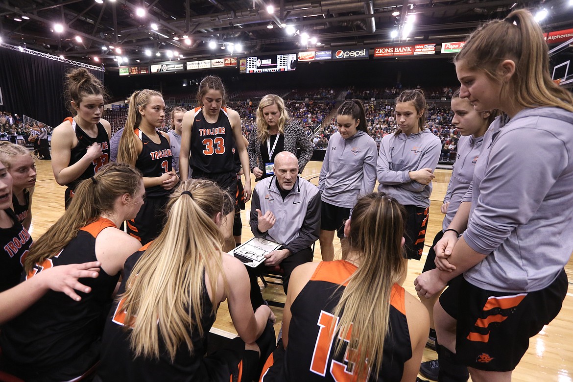 JASON DUCHOW PHOTOGRAPHY
Post Falls girls basketball coach Marc Allert talks to his team during Saturday&#146;s state 5A title game vs. Eagle at the Ford Idaho Center in Nampa.
