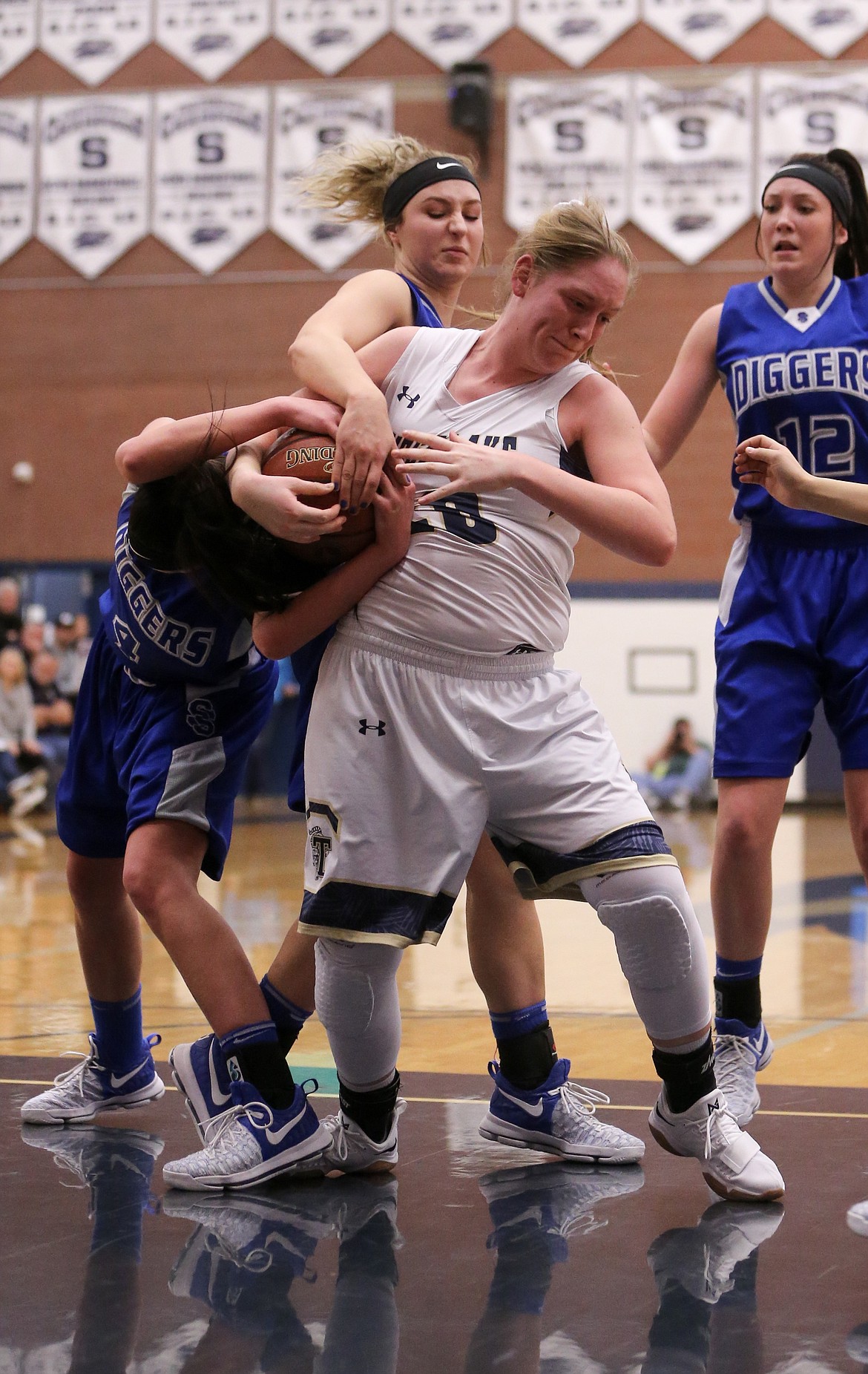 JASON DUCHOW PHOTOGRAPHY
Brooke Jessen of Timberlake battles a pair of Sugar-Salem players for the ball during a state 3A semifinal game Friday night at Skyview High in Nampa.