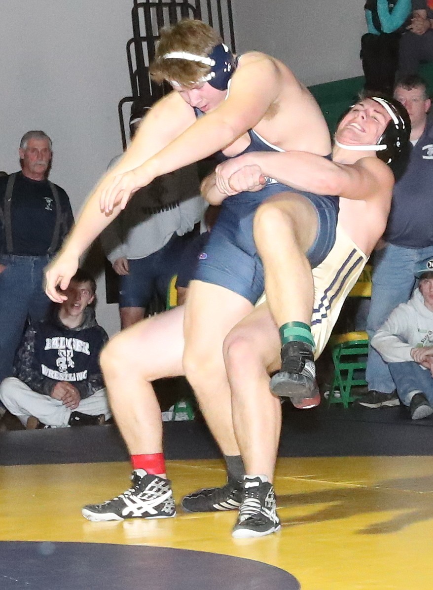 Photos by ERIC PLUMMER
Timberlake&#146;s Jeremy McLemore, right, throws Bonners Ferry&#146;s Gabe See in the finals of the 195-pound bracket, as the Tigers won the program&#146;s first district championship.