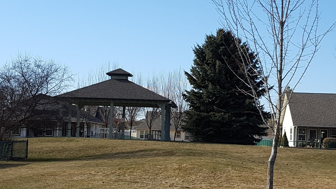 Picnic area for the fenced, neighborhood park located in Canfield Corners.
