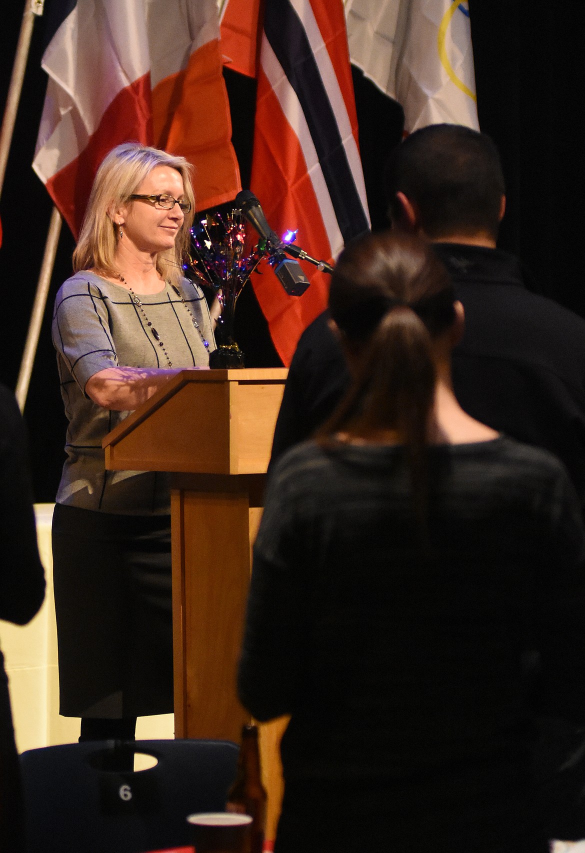 Linda Engh-Grady, president of the Whitefish Community Foundation, accepts the Whitefish Chamber of Commerce&#146;s Great Whitefish Award during the Feb. 7 awards gala at the O&#146;Shaughnessy Center. (Daniel McKay photos/Whitefish Pilot)