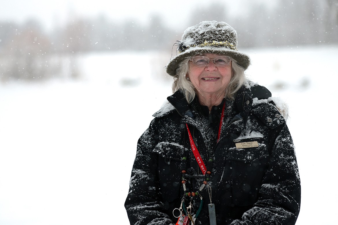 Jan Thon, instructor at The Becoming an Outdoors-Woman ice fishing workshop, poses for a photo at Pine Grove Pond on Saturday. (Casey Kreider/Daily Inter Lake)