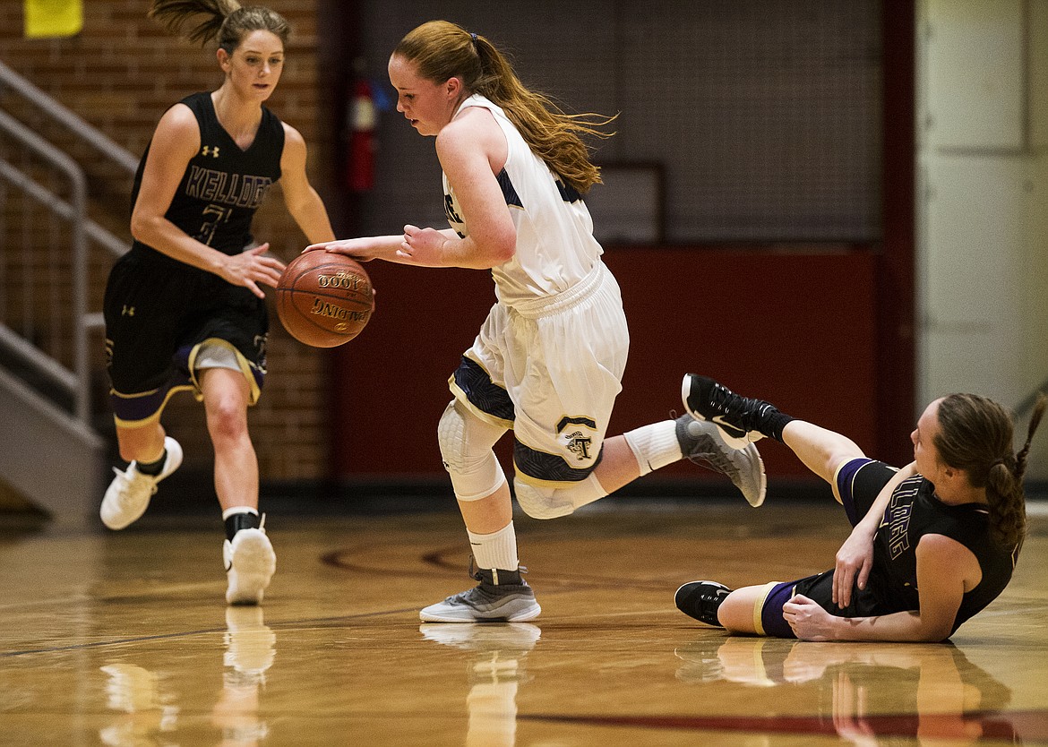 LOREN BENOIT/Press
Timberlake&#146;s Karissa Willis dribbles the ball down the court against Kellogg during the 3A District 1 championship game on Feb. 7 at North Idaho College.