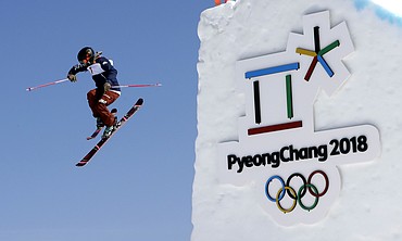 Maggie Voisin, of the United States, jumps during the womens slopestyle finals at Phoenix Snow Park at the 2018 Winter Olympics in Pyeongchang, South Korea, Saturday, Feb. 17, 2018. (AP Photo/Lee Jin-man)