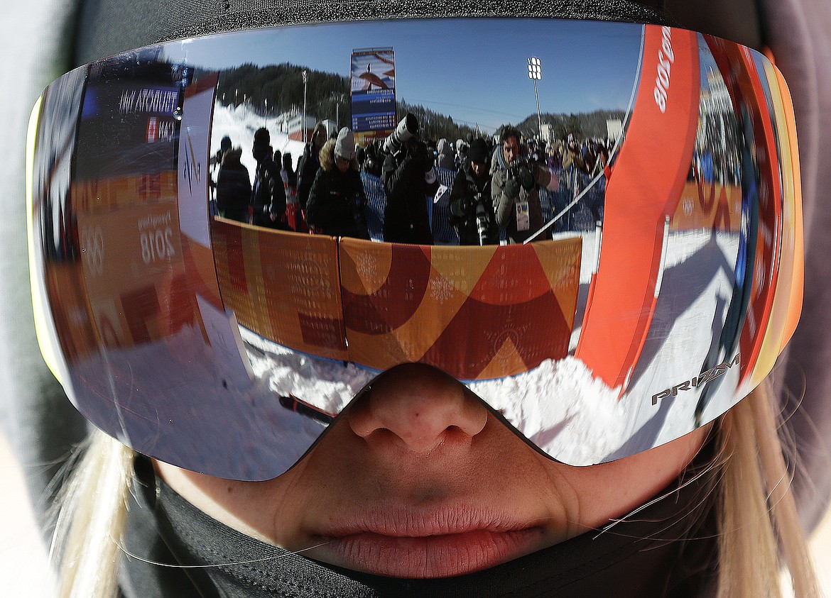 Maggie&#160;Voisin, of the United States, watch other riders after her run during the women&#146;s slopestyle finals at Phoenix Snow Park at the 2018 Winter Olympics in Pyeongchang, South Korea, Saturday, Feb. 17, 2018. (AP Photo/Gregory Bull)