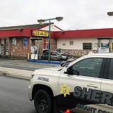 Woman burned at gas station