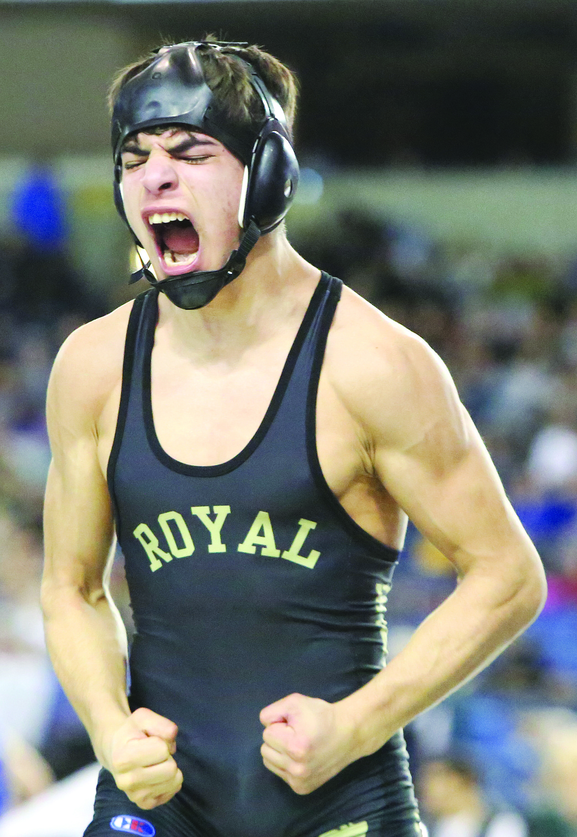 Connor Vanderweyst/Columbia Basin HeraldRoyal's Dominic Martinez exults after beating Jon Figueredo in the 113-pound semifinals at Mat Classic XXX.