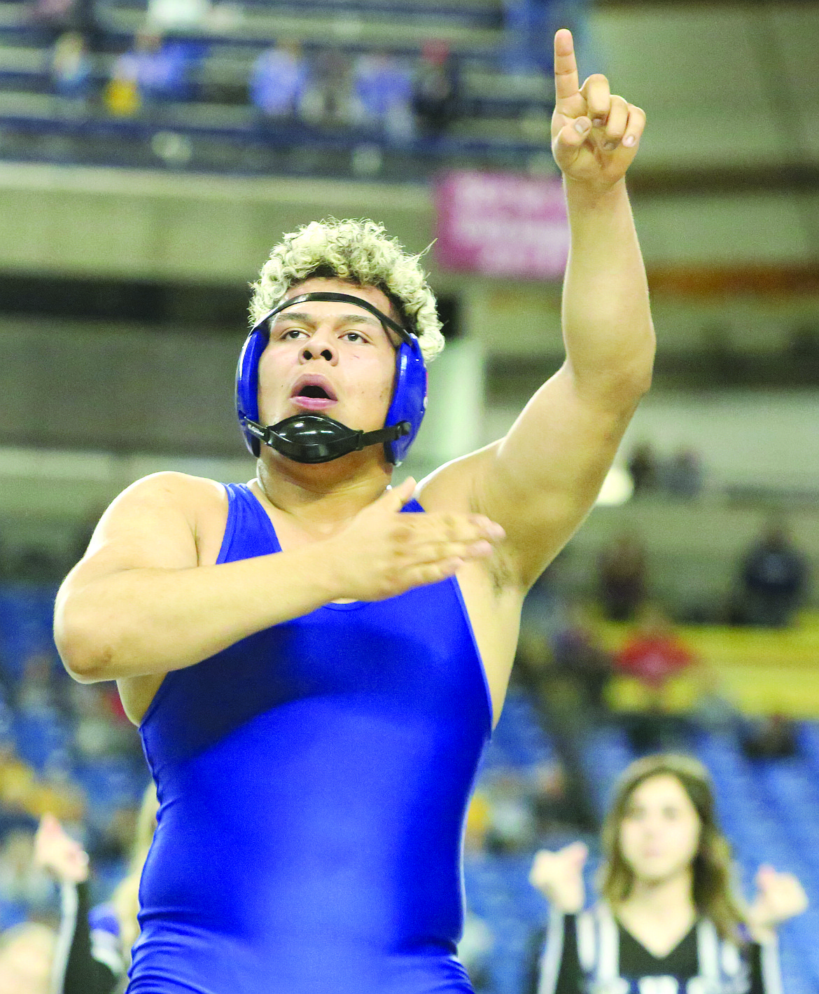 Connor Vanderweyst/Columbia Basin HeraldWarden's Martin Dominguez celebrates winning the 220-pound championship at Mat Classic XXX.