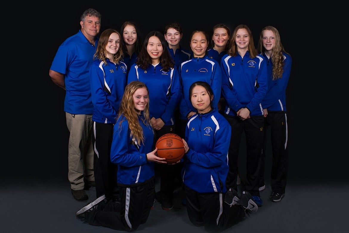Courtesy photo
The North Idaho Christian School junior varsity girls basketball team just completed their season undefeated, 15-0. The team this year was honored to have three foreign exchange students from Korea. In the front is Sarah Hines, left, and Kathy Ko; middle row from left, Jolie Ward, Jinny Choi, Anna Cho and Hailey Jo Parks; and back row from left, coach Mike Anderson, Trinity Knight, Rylee Overturf, Katie Weed and Courtney Monaghan.