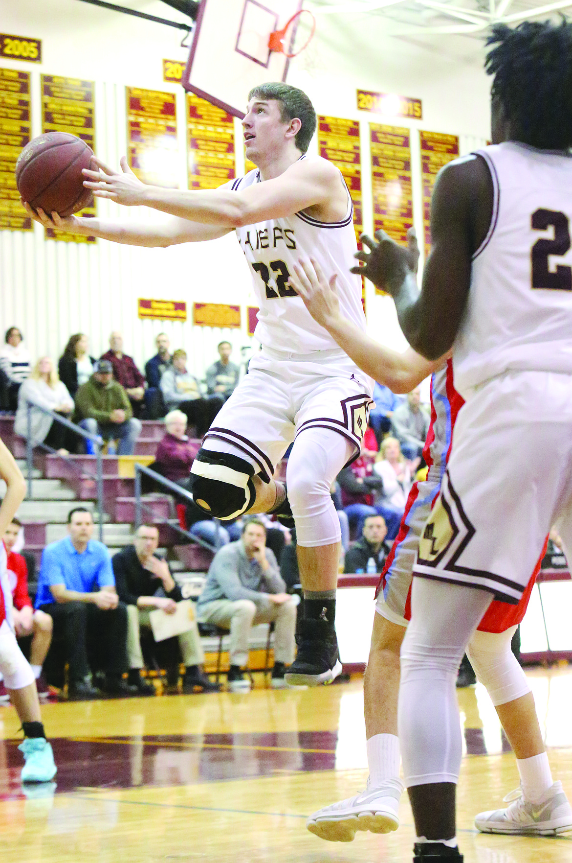 Connor Vanderweyst/Columbia Basin Herald
Moses Lake's Zach Phillips elevates for a finger roll Tuesday against West Valley.