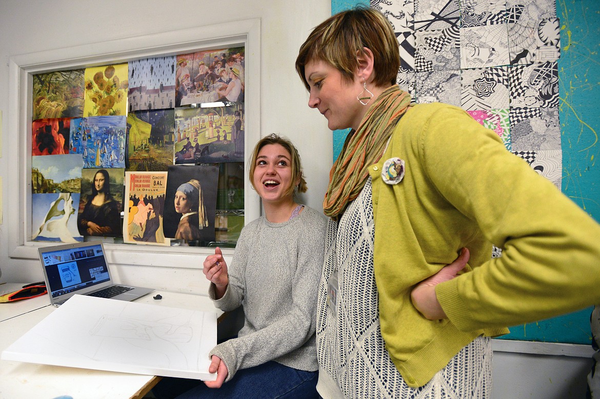 Flathead High School senior Isabella Ross discusses her independent project with teacher Kristie Caratelli.