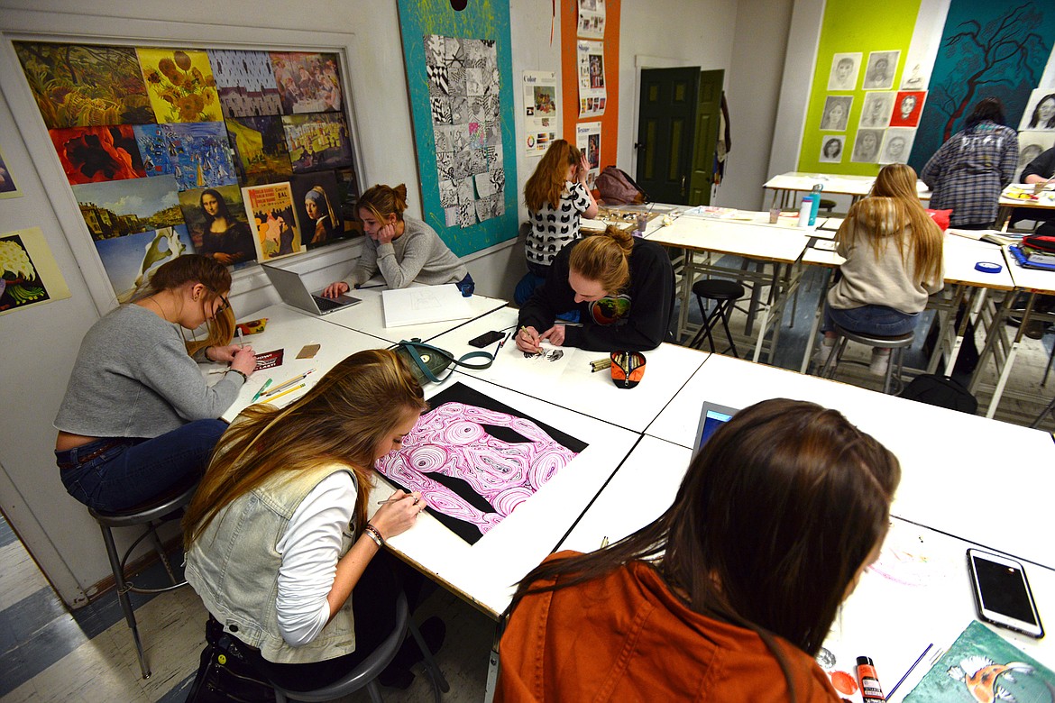 Flathead High School juniors and seniors work on independent projects during teacher Kristie Caratelli&#146;s International Baccalaureate art class.