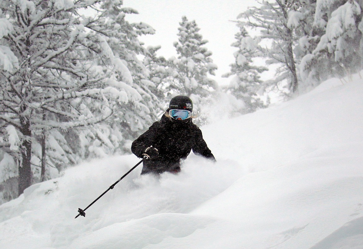 Maggie Voisin skis fresh powder at Whitefish Mountain Resort in December. (Photo courtesy Brian Schott)