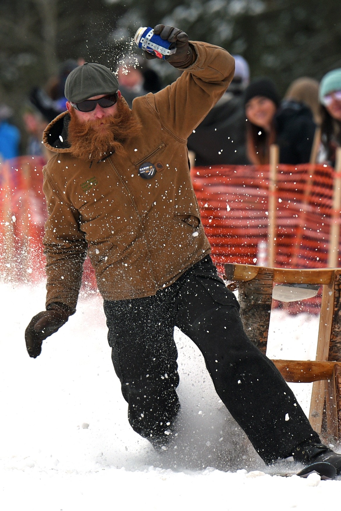 A barstool skier crashes as he races down Sugar Hill during Cabin Fever Days. 
(Casey Kreider/Daily Inter Lake)