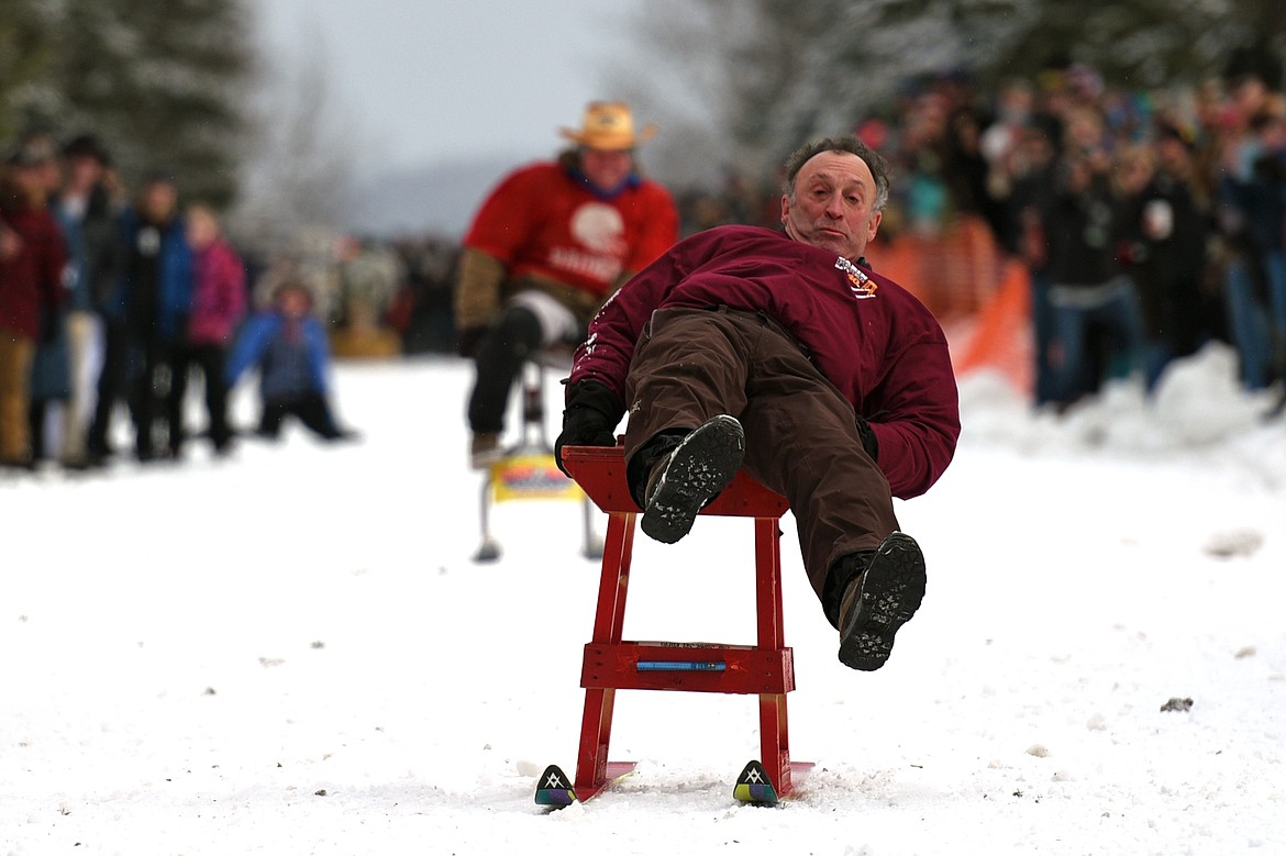 Barstool skiers race down Sugar Hill during Cabin Fever Days in Martin City on Saturday. (Casey Kreider/Daily Inter Lake)