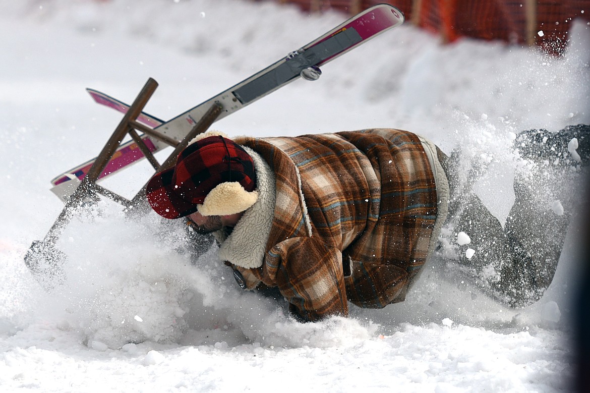 Barstool skiers race down Sugar Hill during Cabin Fever Days in Martin City on Saturday. (Casey Kreider/Daily Inter Lake)