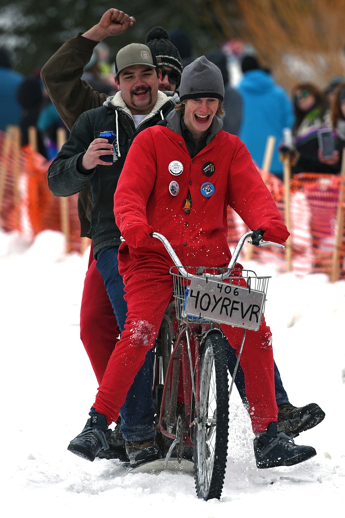 Barstool skiers race down Sugar Hill during Cabin Fever Days in Martin City on Saturday. (Casey Kreider/Daily Inter Lake)