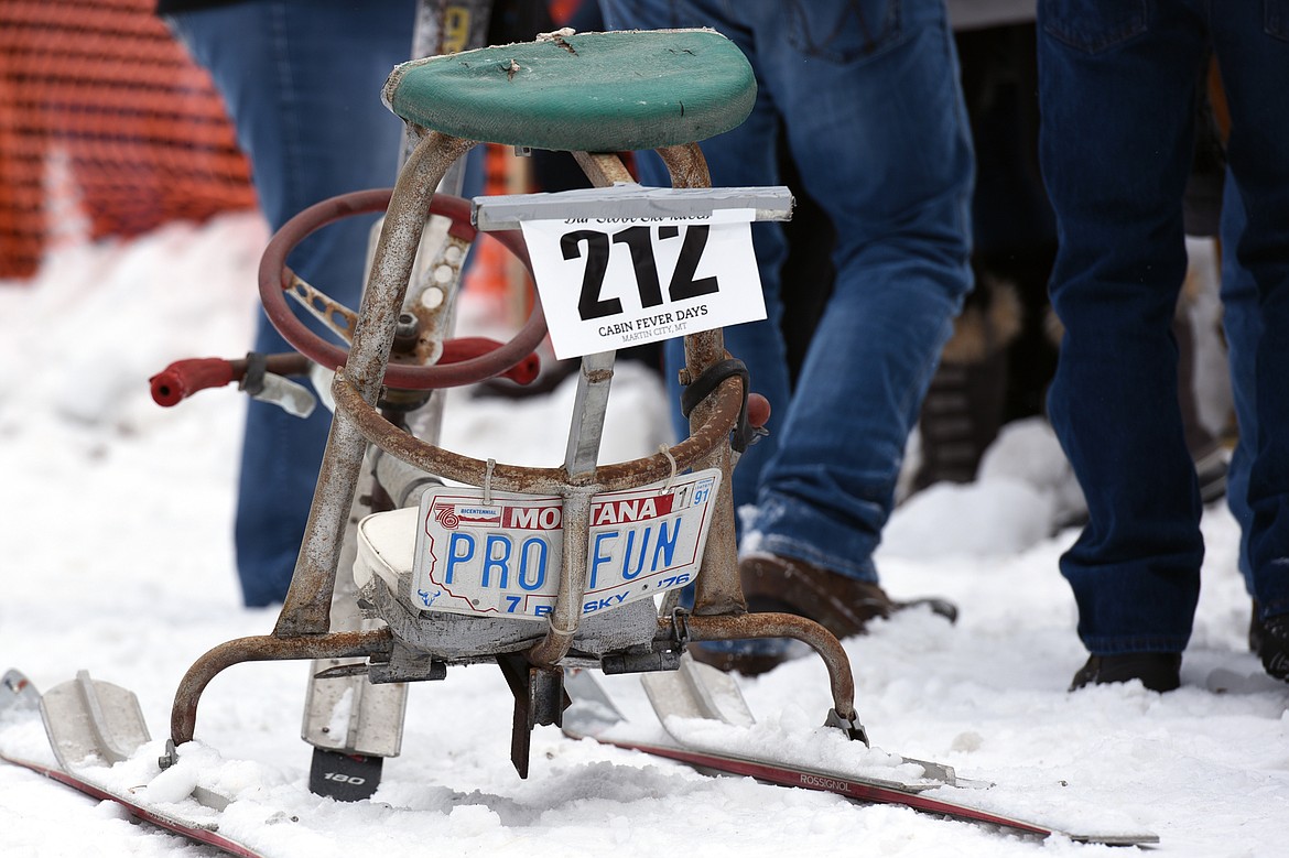 A barstool skier with a custom license plate during Cabin Fever Days in Martin City on Saturday. (Casey Kreider/Daily Inter Lake)