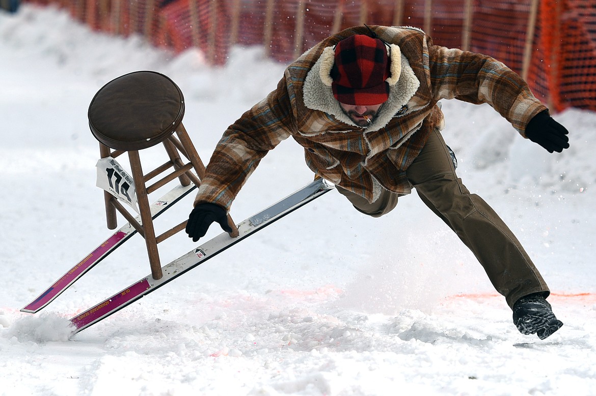 Barstool skiers race down Sugar Hill during Cabin Fever Days in Martin City on Saturday. (Casey Kreider/Daily Inter Lake)