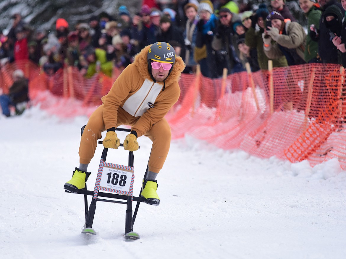 Whitey the Lion keeps it upright as he heads down Sugar Hill.