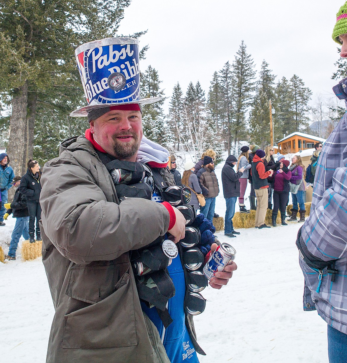 Spectator Aaron Gibson kept a suplly on beer in hand.