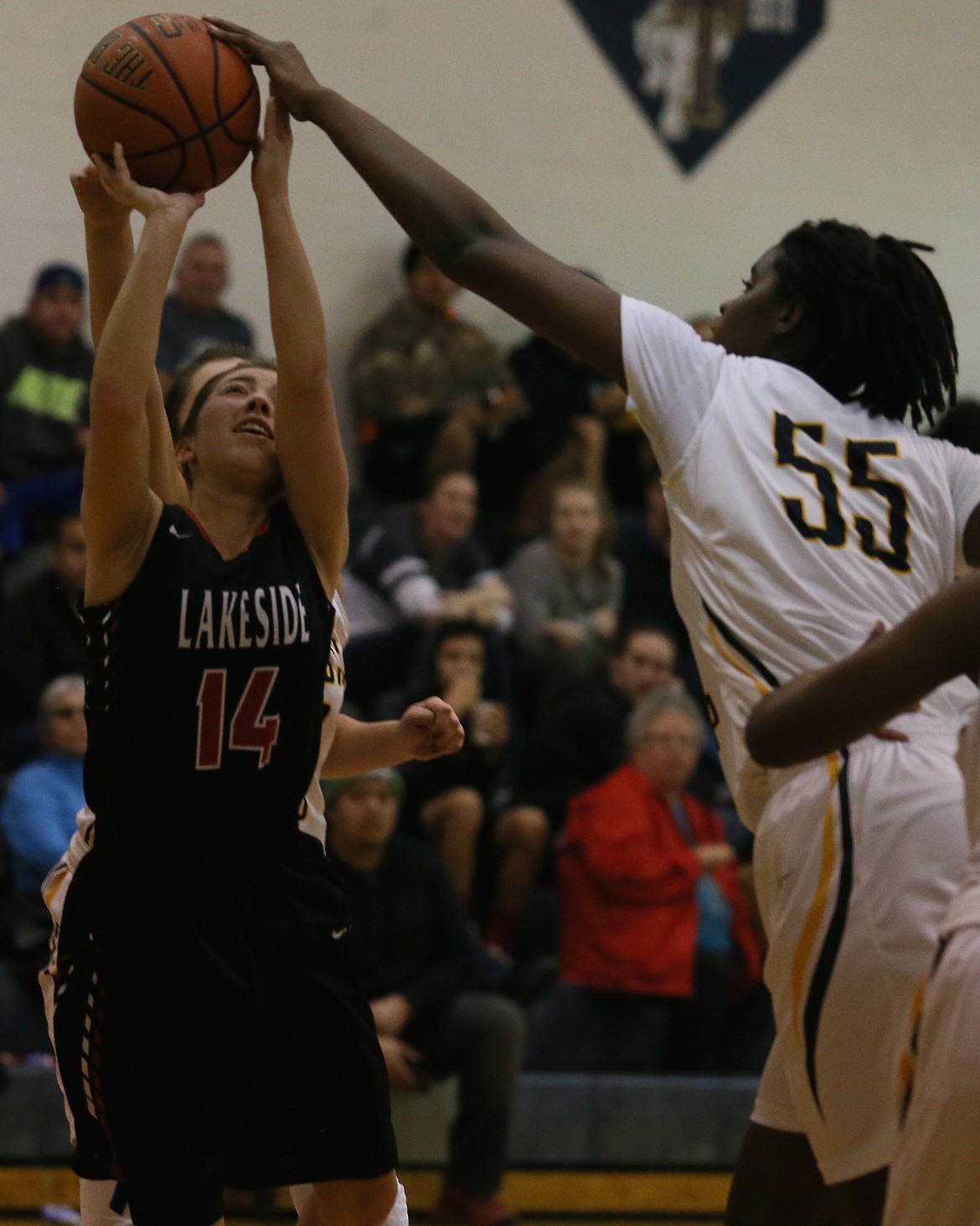 JASON ELLIOTT/Press
Genesis Prep post Bella Murekatate blocks the shot of Lakeside guard Alyssa SiJohn in the third quarter of Friday&#146;s 1A Division II District 1 championship game at Timberlake High.