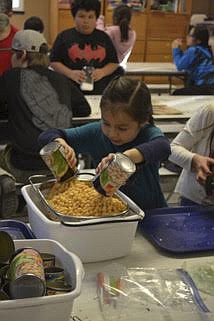 A YOUNG GIRL learns about healthy eating through St. Luke's 5210 program. (Photo provided)