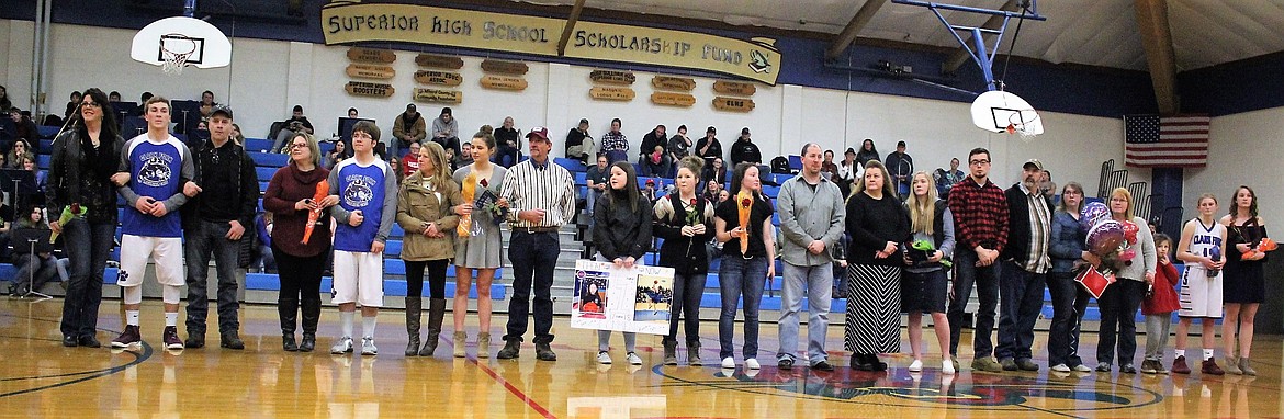 Seniors for the Clark Fork Mountain Cats were introduced along with family members during Senior Night in Superior on Feb. 9. (Kathleen Woodford/Mineral Independent).