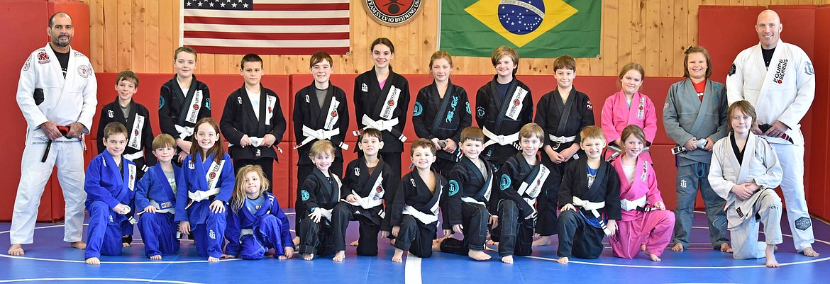 The younger class grouped together after their lessons and promotions.