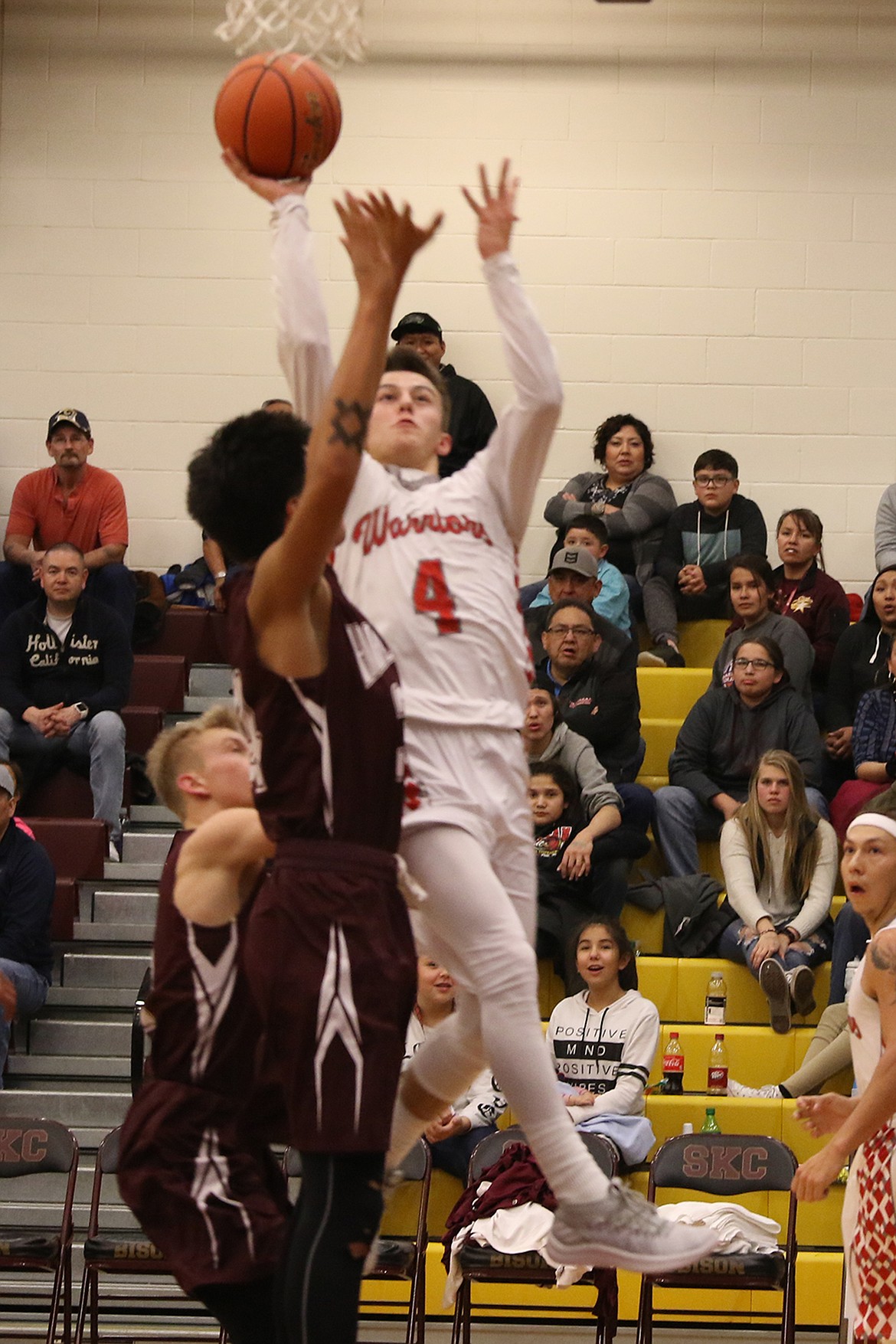 ARLEE WARRIORS star player Will Mesteth (4) drives to the lane against the Rocky Boy defensive in the season-opening series in the Native American Classic at Joe McDonald Gym in Salish Kootenai College. The Warriors are the defending Class C state champions after defeating Manhattan Christian 71-67 in last year&#146;s Class C state basketball championship game at the Butte Civic Center. If Arlee makes it to Saturday night it will be their third-consecutive trip to the Class C championship game. The Warriors, a team that has a bye in the first round of the District, will await the winner of Noxon and Two Eagle River in the second round of the District Tournament will be held Feb. 15-17 at Joe McDonald Gym in Salish Kootenai College.   (Photo by Bob Gunderson/Courtesy of Bob Gunderson)