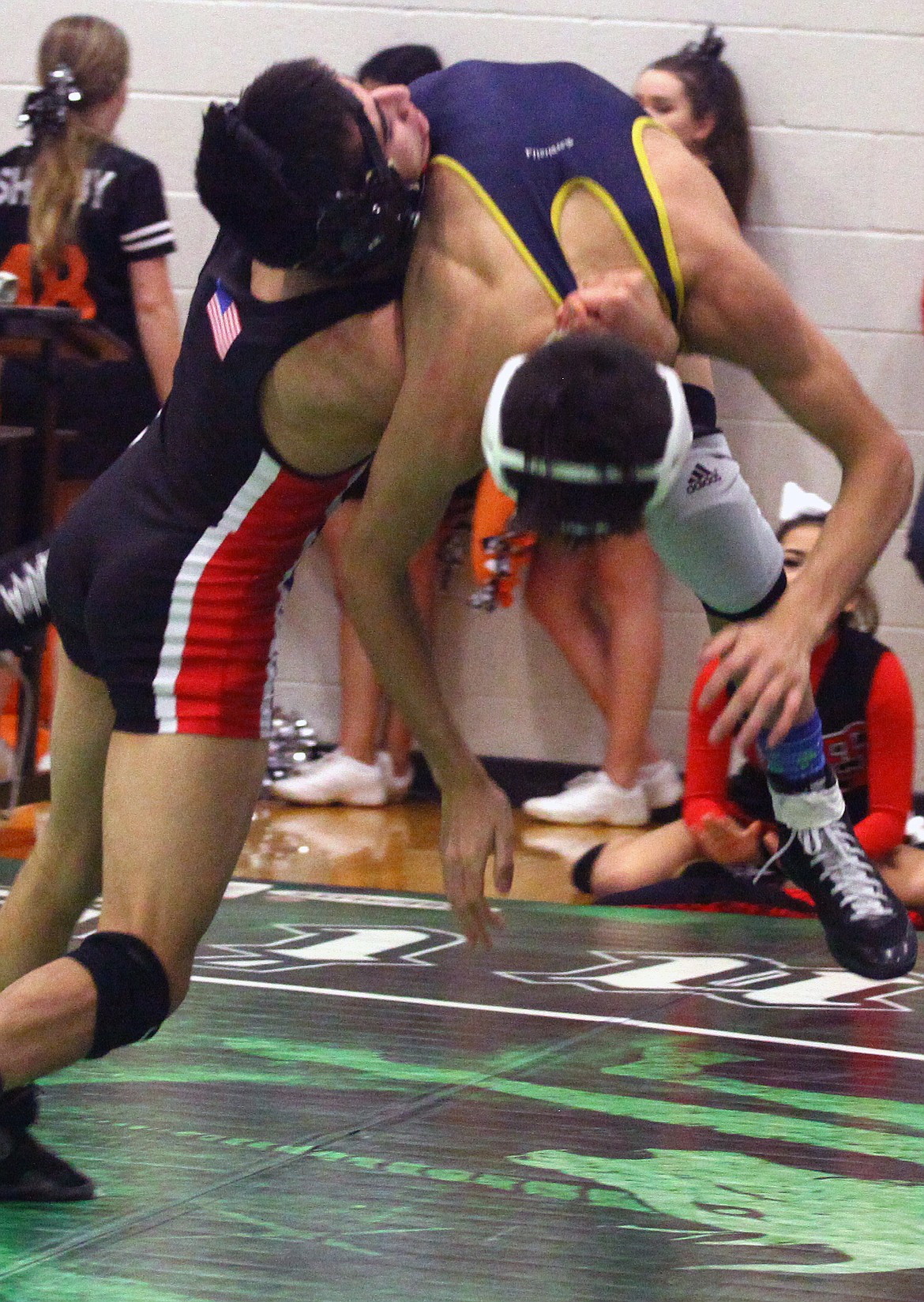Rodney Harwood/Columbia Basin Herald
Othello senior throws Andy Pimental of Selah during the 106-pound semifinal match on Saturday at the 2A Region 4 tournament at East Valley in Spokane. Melo won the regional championship.