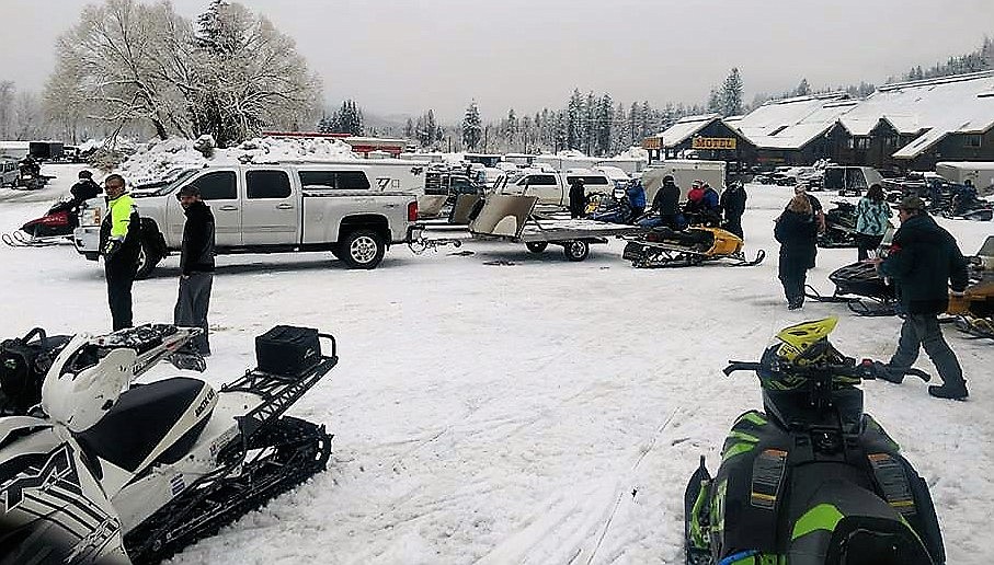 Snowmobilers from all over the Northwest gathered outside the 50,000 Silver Dollar Bar in Haugan to begin their 50-mile poker ride, hosted by the Montana Nightriders Snowmobile Club.