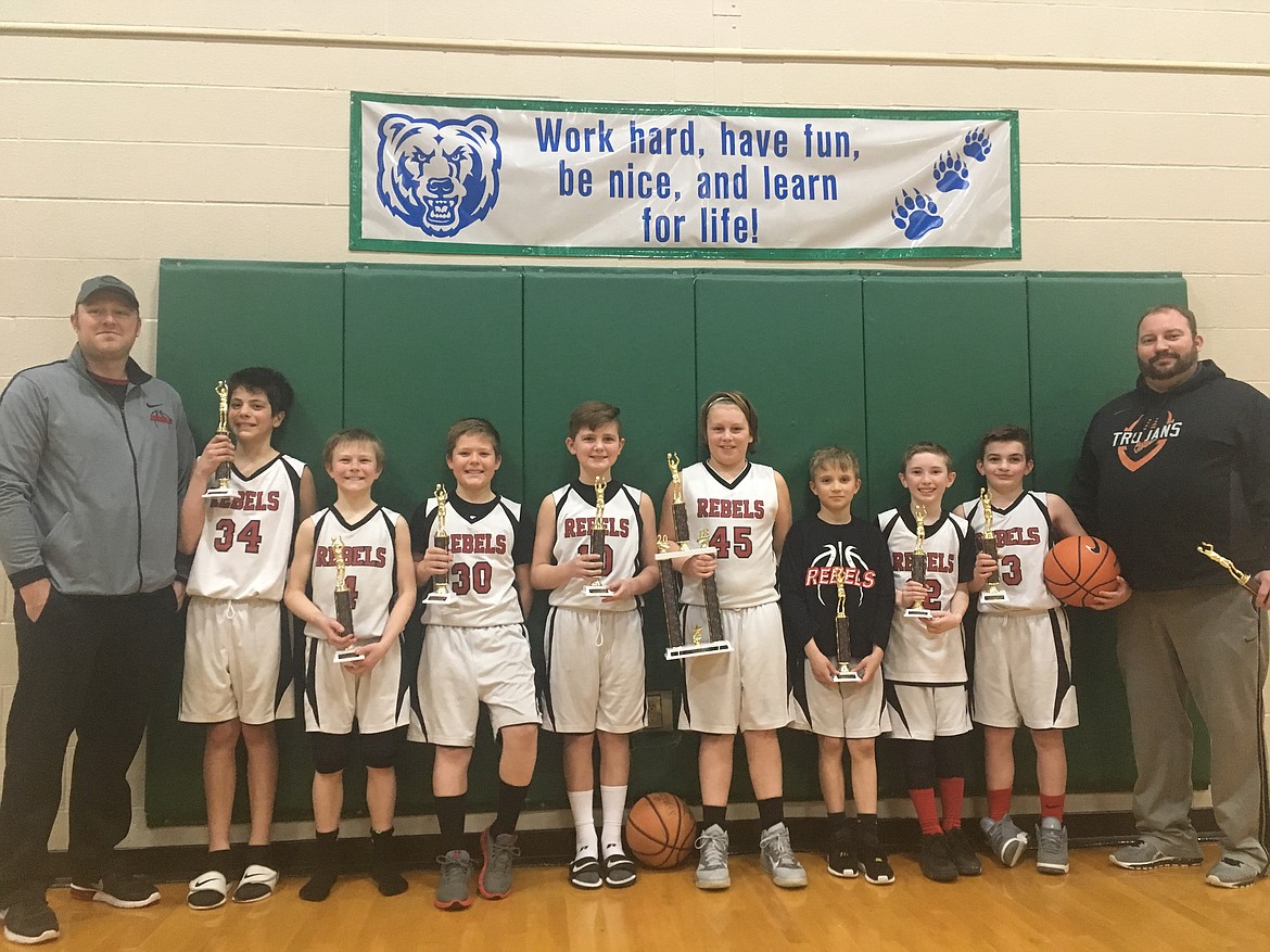 Courtesy photo
The Rebels fifth-grade boys basketball team went undefeated in the recent Lake City Shootout AAU tournament. From left are coach Ryan Sandaker, Tyras Blake, Trenton McLean, Kyler Cooley, Shaun Hudson, Cannon McKeown, Cobe Cameron, Isaac McKeown and coach Mike McKeown.