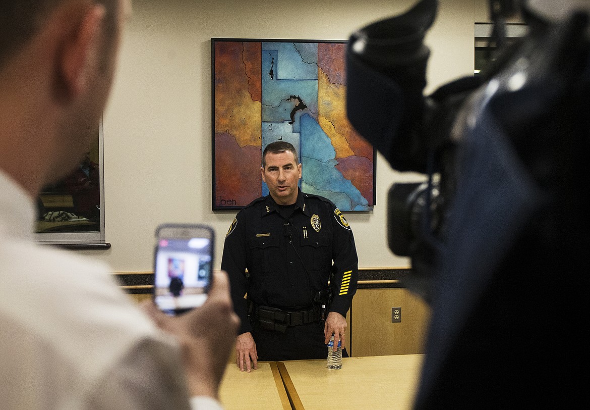 Coeur d&#146;Alene Police Chief Lee White speaks to members of the media Tuesday night about a shooting in which one police officer was wounded and a suspect was shot and killed. (LOREN BENOIT/Press)