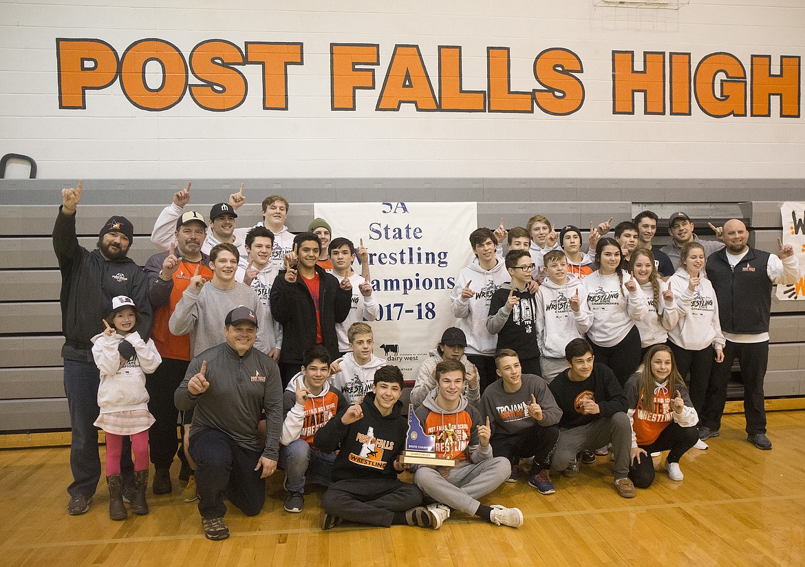 The Post Falls High School wrestling team poses for a group photo after a pep rally Sunday afternoon at school.The team posted a 338.5 score in Pocatello to capture the 5A State team title. (LOREN BENOIT/Press)
