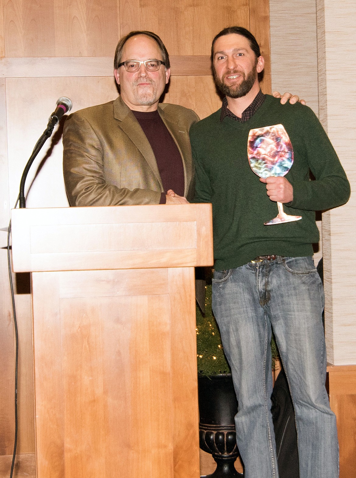 (Photo courtesy LORI STRATTON)
Tom Wilbur, left, awards Charlie Walker of Vehrs with the &#147;2018 Iron Sommelier&#148; title in a race that marked his third consecutive victory.