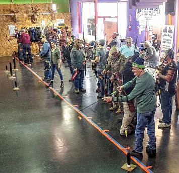 Courtesy photo
Archers line up at the Coeur d'Alene Bowmen range in Post Falls. Those who like a little competition participate in the 10-week winter league, which runs through March.  The Coeur d' Alene Bowmen are a nonprofit solely run by volunteers.