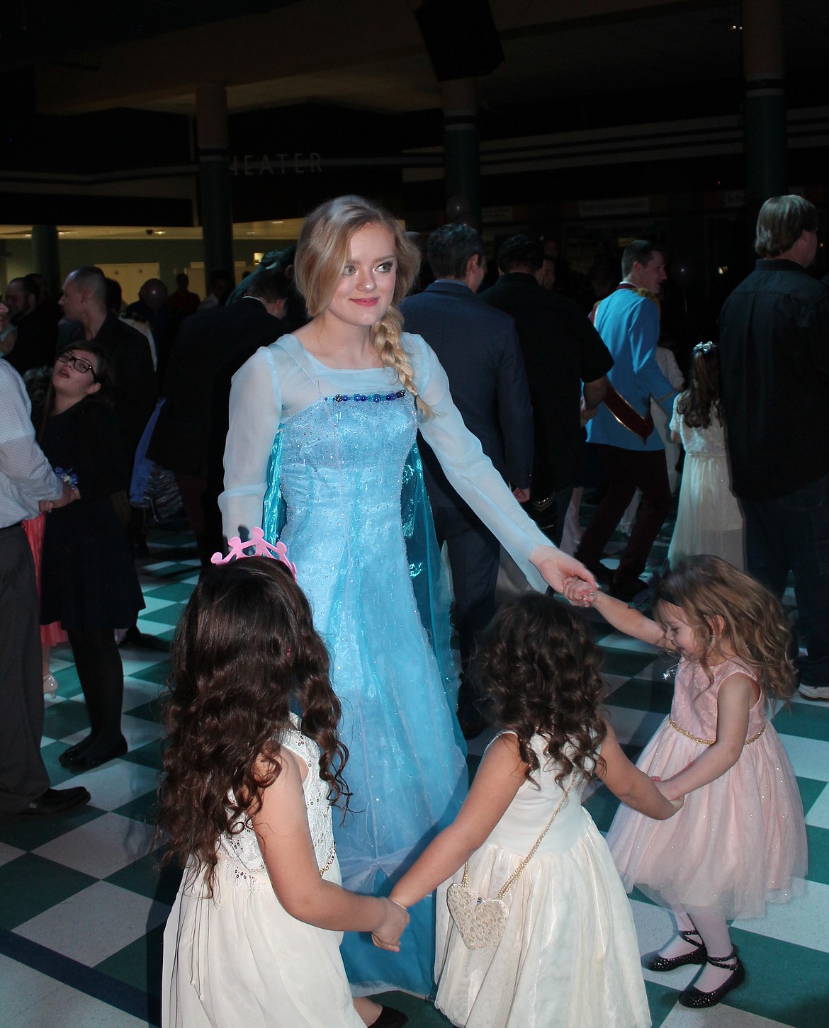 Joel Martin/Columbia Basin Herald
Elsa (actually MLHS sophomore Renee Ohs) dances with some smaller &#8211; but no less lovely &#8211; princesses at the Daddy-Daughter Dance Saturday night.