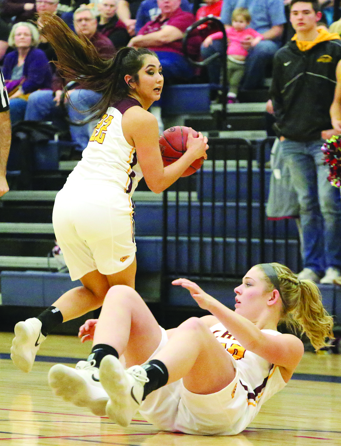 Connor Vanderweyst/Columbia Basin Herald
Moses Lake's Morgan Yamane (background) and Ellie Mayo scramble to maintain possession against Woodinville.