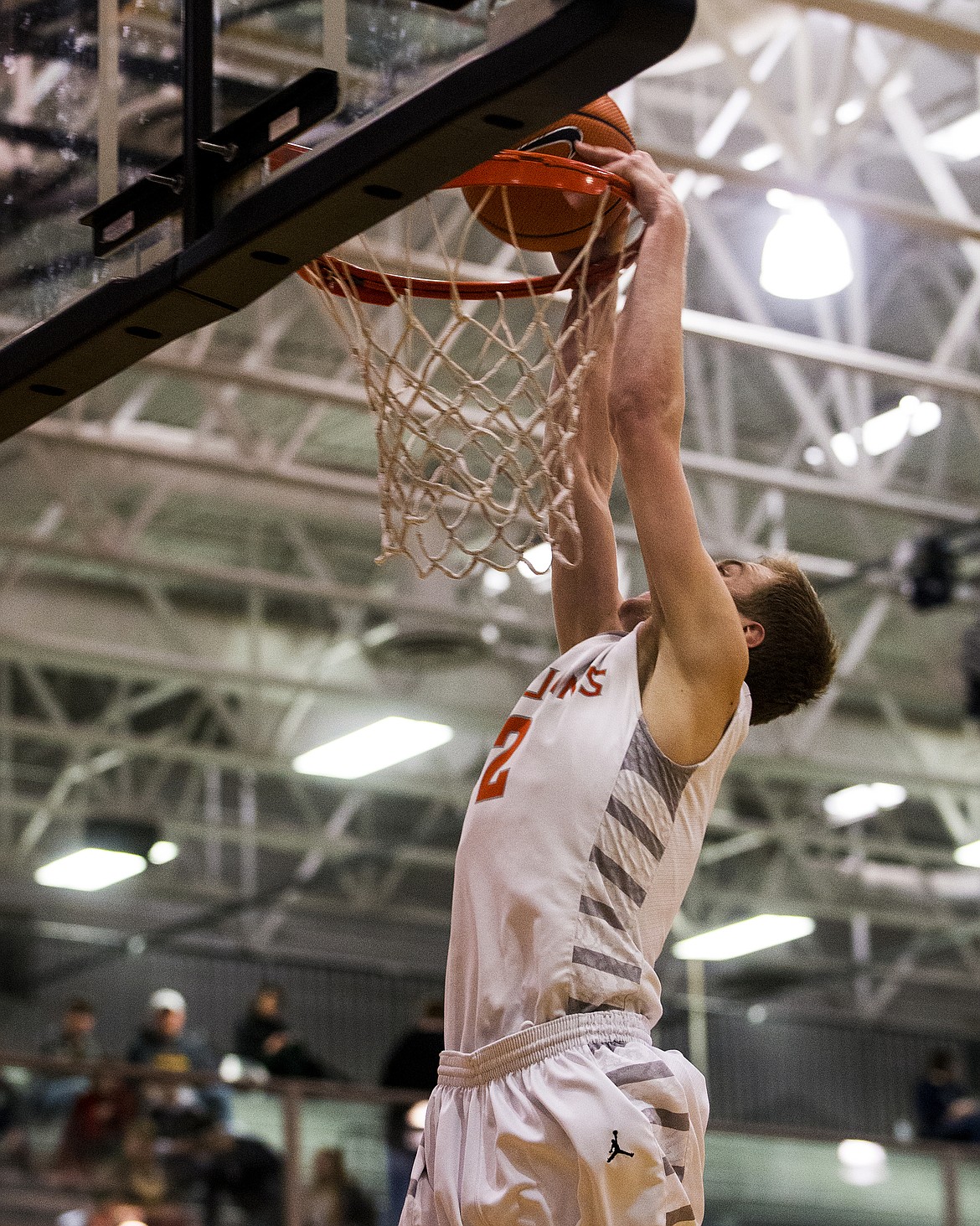 LOREN BENOIT/Press
Colby Gennett of Post Falls dunks against Coeur d&#146;Alene in the 5A Region 1 championship game Tuesday night at Post Falls.