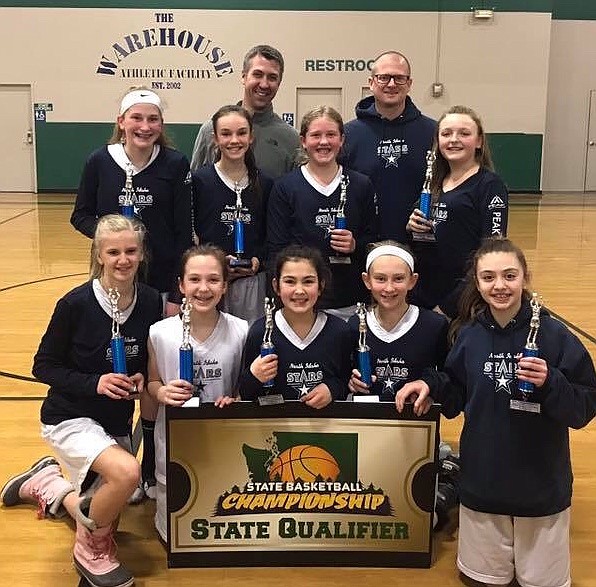 Courtesy photo
The North Idaho Stars sixth-grade AAU girls basketball team won the Spokane AAU Shoutout Spring Classic last weekend at The Warehouse in Spokane. The girls attend Coeur d&#146;Alene and Lakeland schools. In the front row from left are Caroline Gallus, Ella Terzulli, Madison Mitchell, Ava Yates and Kylin Chavez; second row from left, Jen Johnson, Sam Beamis, Kelsey Carroll and Olivia Naccarato; and back row from left, coaches Jeramie Terzulli and Eli Yates.