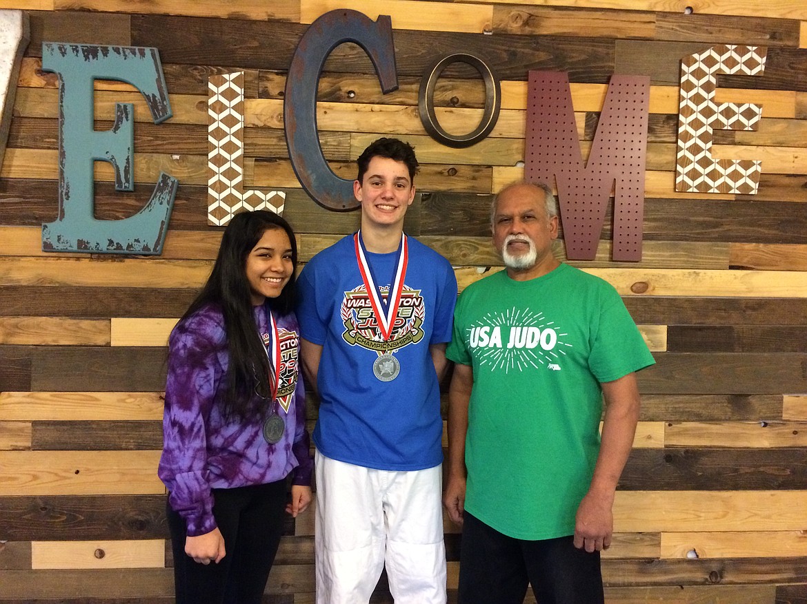 Courtesy photo
Goshinjitsu students of Hayden shined at a tournament Saturday in Kent, Wash., sponsored by Washington State Judo Institute. From left are Judo silver medalists Raji Singh and Nathan Wood, pictured with their instructor, Bijay Singh.