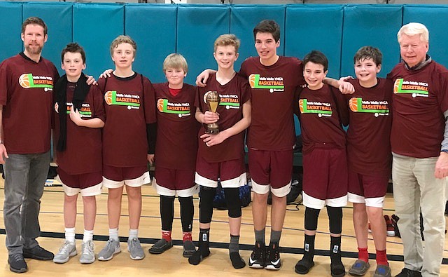 Courtesy photo
The North Idaho Elite seventh-grade boys basketball team went 5-0 this past weekend to win the 25th annual Walla Walla YMCA Shootout. From left are coach Ryan Nipp, Jesse Brown, Andrew Karns, Colton Farrar, Trey Nipp, Riggs Westlund, Luke West, Alexander Nipp and coach Charlie Nipp.