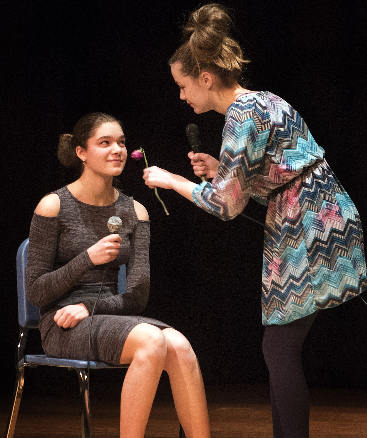 Ave&#146; McDonald (left) and Emma Upton perform their comedy sketch &#147;Skin Therapy&#148; at the Columbia Falls High School Talent Show Tuesday. (Jeremy Weber photo)