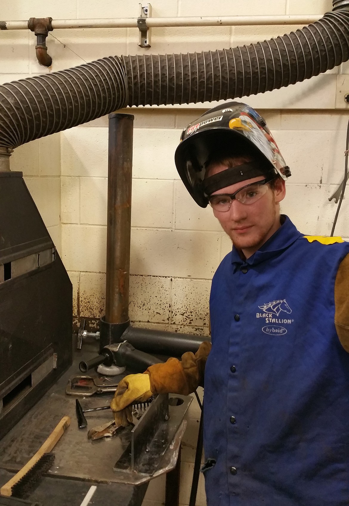 Libby High School student Jonathan gets ready to weld for the Flathead Valley Community College Welding Competition, Feb. 22.