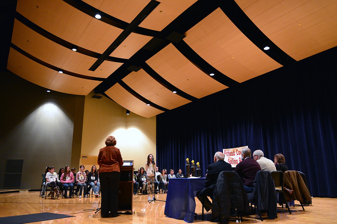 Chloe Savoy of Ruder Elementary spells during the first round of the Flathead County Spelling Bee at Glacier High School on Thursday, Feb. 22. (Casey Kreider/Daily Inter Lake)